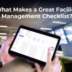 A person holding a tablet displaying a digital facility management checklist interface inside a modern office environment.