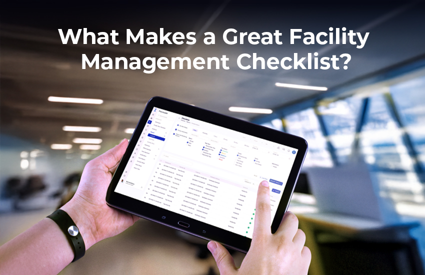A person holding a tablet displaying a digital facility management checklist interface inside a modern office environment.